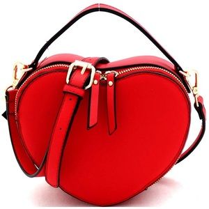 NWT Red heart-shaped cross-body purse.